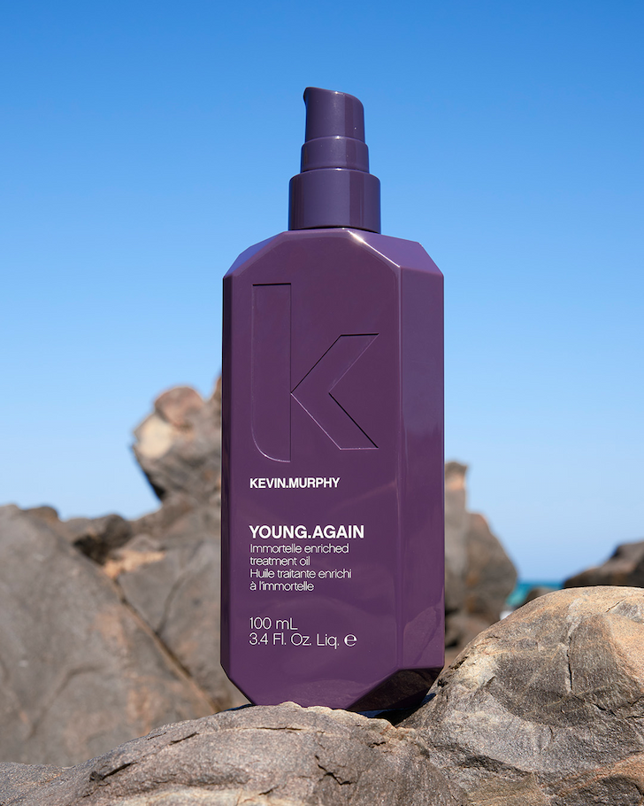 Hair care products arranged on a neutral background